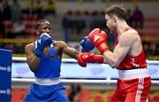 8 March 2024; Aliaksei Alfiorau of Individual Neutral Athletes, right, in action against Kevin Boakye Schumann of Germany during their Men's 80kg Round of 32 bout during day six at the Paris 2024 Olympic Boxing Qualification Tournament at E-Work Arena in Busto Arsizio, Italy. Photo by Ben McShane/Sportsfile