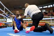 8 March 2024; Kevin Boakye Schumann of Germany reacts after being knocked out by Aliaksei Alfiorau of Individual Neutral Athletes in their Men's 80kg Round of 32 bout during day six at the Paris 2024 Olympic Boxing Qualification Tournament at E-Work Arena in Busto Arsizio, Italy. Photo by Ben McShane/Sportsfile