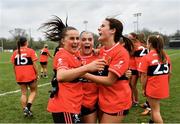 8 March 2024; University College Cork players, from left, Kellyann Hogan, Abigail Ring, and Aine O'Neill after their side's victory in the 2024 Ladies HEC O’Connor Cup semi-final match between University College Cork and Ulster University at MTU Cork. Photo by Stephen Marken/Sportsfile