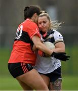 8 March 2024; Paige Smyth of Ulster University in action against Aine O'Neill of University College Cork during the 2024 Ladies HEC O’Connor Cup semi-final match between University College Cork and Ulster University at MTU Cork. Photo by Stephen Marken/Sportsfile