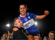 8 March 2024; Danielle O'Leary of MTU Kerry is lifted by her father Dan after the 2024 Ladies HEC Giles Cup final match between Maynooth University and MTU Kerry at MTU Cork. Photo by Stephen Marken/Sportsfile