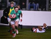 8 March 2024; Finn Treacy of Ireland on his way to scoring his side's first try during the U20 Six Nations Rugby Championship match between England and Ireland at The Recreation Ground in Bath, England. Photo by Harry Murphy/Sportsfile