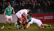 8 March 2024; Hugo McLaughlin of Ireland is tackled by Ben Waghorn and Toby Cousins of England during the U20 Six Nations Rugby Championship match between England and Ireland at The Recreation Ground in Bath, England. Photo by Harry Murphy/Sportsfile