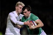 8 March 2024; Hugo McLaughlin of Ireland is tackled by Archie McParland of England during the U20 Six Nations Rugby Championship match between England and Ireland at The Recreation Ground in Bath, England. Photo by Harry Murphy/Sportsfile