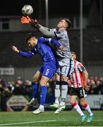 8 March 2024; Derry City goalkeeper Brian Maher in action against Grant Horton of Waterford during the SSE Airtricity Men's Premier Division match between Derry City and Waterford at The Ryan McBride Brandywell Stadium in Derry. Photo by Ramsey Cardy/Sportsfile