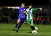 8 March 2024; Callum Thompson of Bray Wanderers in action against Scott Kirkland of Treaty United  during the SSE Airtricity Men's First Division match between Treaty United and Bray Wanderers at Markets Field in Limerick. Photo by Michael P Ryan/Sportsfile