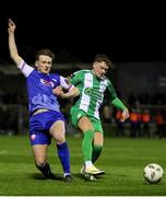 8 March 2024; Callum Thompson of Bray Wanderers in action against Scott Kirkland of Treaty United  during the SSE Airtricity Men's First Division match between Treaty United and Bray Wanderers at Markets Field in Limerick. Photo by Michael P Ryan/Sportsfile