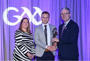 8 March 2024; Mark Bergin of O'Loughlin Gaels, centre, is presented with his AIB GAA Club Hurling Team of the Year Award by AIB Head of Marketing Engagement Nuala Kroondijk and Uachtarán Chumann Lúthchleas Gael Jarlath Burns during the AIB GAA Club Players Awards, held at Croke Park in Dublin. Photo by Sam Barnes/Sportsfile