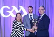 8 March 2024; Huw Lawlor of O'Loughlin Gaels, centre, is presented with his AIB GAA Club Hurling Team of the Year Award by AIB Head of Marketing Engagement Nuala Kroondijk and Uachtarán Chumann Lúthchleas Gael Jarlath Burns during the AIB GAA Club Players Awards, held at Croke Park in Dublin. Photo by Sam Barnes/Sportsfile