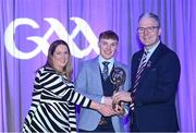 8 March 2024; David Fogarty of O'Loughlin Gaels, centre, is presented with his AIB GAA Club Hurling Team of the Year Award by AIB Head of Marketing Engagement Nuala Kroondijk and Uachtarán Chumann Lúthchleas Gael Jarlath Burns during the AIB GAA Club Players Awards, held at Croke Park in Dublin. Photo by Sam Barnes/Sportsfile