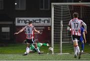 8 March 2024; Patrick Hoban of Derry City scores his side's first goal past Waterford goalkeeper Sam Sargeant during the SSE Airtricity Men's Premier Division match between Derry City and Waterford at The Ryan McBride Brandywell Stadium in Derry. Photo by Ramsey Cardy/Sportsfile