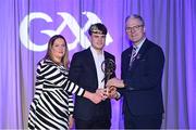 8 March 2024; Ben O'Carroll of St Brigid's, centre, is presented with the AIB Club Football Team of the Year Award by AIB Head of Marketing Engagement Nuala Kroondijk and Uachtarán Chumann Lúthchleas Gael Jarlath Burns during the AIB GAA Club Players Awards, held at Croke Park in Dublin. Photo by Sam Barnes/Sportsfile