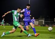 8 March 2024; Cristion Magerusan of Bray Wanderers in action against Oisin O'Reilly of Treaty United during the SSE Airtricity Men's First Division match between Treaty United and Bray Wanderers at Markets Field in Limerick. Photo by Michael P Ryan/Sportsfile