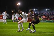 8 March 2024; Paddy Kirk of Bohemians in action against Sean Gannon of Shelbourne during the SSE Airtricity Men's Premier Division match between Bohemians and Shelbourne at Dalymount Park in Dublin. Photo by Stephen McCarthy/Sportsfile