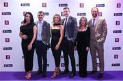 8 March 2024; Watty Grahams Glen footballers and their partners, from left, Michael Warnock with his wife Leanne Warnock, Emmett Bradley with wife Laura Bradley and Conor Glass with his fiance Niamh O'Donnell during the AIB GAA Club Players Awards, held at Croke Park in Dublin. Photo by Sam Barnes/Sportsfile