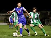 8 March 2024; Ben O'Riordan of Treaty United in action against Harry Groome of Bray Wanderers during the SSE Airtricity Men's First Division match between Treaty United and Bray Wanderers at Markets Field in Limerick. Photo by Michael P Ryan/Sportsfile