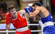 8 March 2024; Jude Gallagher of Ireland, left, in action against Uddin Mohammed Hussam of India during their Men's 57kg Round of 32 bout during day six at the Paris 2024 Olympic Boxing Qualification Tournament at E-Work Arena in Busto Arsizio, Italy. Photo by Ben McShane/Sportsfile