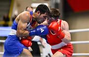 8 March 2024; Jude Gallagher of Ireland, right, in action against Uddin Mohammed Hussam of India during their Men's 57kg Round of 32 bout during day six at the Paris 2024 Olympic Boxing Qualification Tournament at E-Work Arena in Busto Arsizio, Italy. Photo by Ben McShane/Sportsfile