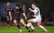 8 March 2024; James Clarke of Bohemians in action against Evan Caffrey of Shelbourne during the SSE Airtricity Men's Premier Division match between Bohemians and Shelbourne at Dalymount Park in Dublin. Photo by Shauna Clinton/Sportsfile