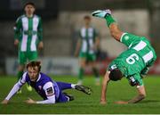 8 March 2024; Cristion Magerusan of Bray Wanderers is fouled by Evan O'Connor of Treaty United during the SSE Airtricity Men's First Division match between Treaty United and Bray Wanderers at Markets Field in Limerick. Photo by Michael P Ryan/Sportsfile