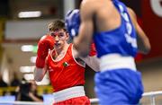8 March 2024; Jude Gallagher of Ireland during their Men's 57kg Round of 32 bout against Uddin Mohammed Hussam of India during day six at the Paris 2024 Olympic Boxing Qualification Tournament at E-Work Arena in Busto Arsizio, Italy. Photo by Ben McShane/Sportsfile