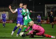 8 March 2024; Treaty United goalkeeper Corey Chambers makes a save from Callum Thompson of Bray Wanderers during the SSE Airtricity Men's First Division match between Treaty United and Bray Wanderers at Markets Field in Limerick. Photo by Michael P Ryan/Sportsfile