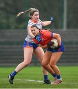 9 March 2024; Rachel O’Brien of MICL is tackled by Grace Esler of ATU Sligo during the 2024 Ladies HEC Moynihan Cup final match between Atlantic Technological University Sligo and Mary Immaculate College Limerick at MTU Cork. Photo by Brendan Moran/Sportsfile