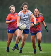 9 March 2024; Niamh Boyle of ATU Sligo in action against Liz McGrath, left, and Kate Kennedy of MICL during the 2024 Ladies HEC Moynihan Cup final match between Atlantic Technological University Sligo and Mary Immaculate College Limerick at MTU Cork. Photo by Brendan Moran/Sportsfile