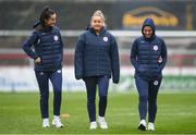 9 March 2024; Shelbourne players, from left, Alex Kavanagh, Nadine Clare and Mia Dodd inspect the pitch before the SSE Airtricity Women's Premier Division match between Shelbourne and Sligo Rovers at Tolka Park in Dublin. Photo by Shauna Clinton/Sportsfile