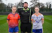 9 March 2024; Referee Aaron Clogher with team captains Ciara Hynes of MICL, left, and Roisin Rodgers of ATU Sligo before the 2024 Ladies HEC Moynihan Cup final match between Atlantic Technological University Sligo and Mary Immaculate College Limerick at MTU Cork. Photo by Brendan Moran/Sportsfile