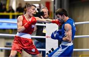 9 March 2024; Bartlomiej Roskowicz of Poland, left, in action against Saparmyrat Roskowicz of Turkmenistan during their Men's 63.5kg Round of 16 bout during day seven at the Paris 2024 Olympic Boxing Qualification Tournament at E-Work Arena in Busto Arsizio, Italy. Photo by Ben McShane/Sportsfile