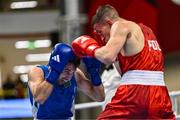 9 March 2024; Bartlomiej Roskowicz of Poland, right, in action against Saparmyrat Roskowicz of Turkmenistan during their Men's 63.5kg Round of 16 bout during day seven at the Paris 2024 Olympic Boxing Qualification Tournament at E-Work Arena in Busto Arsizio, Italy. Photo by Ben McShane/Sportsfile