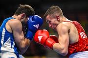 9 March 2024; Bartlomiej Roskowicz of Poland, right, in action against Saparmyrat Roskowicz of Turkmenistan during their Men's 63.5kg Round of 16 bout during day seven at the Paris 2024 Olympic Boxing Qualification Tournament at E-Work Arena in Busto Arsizio, Italy. Photo by Ben McShane/Sportsfile