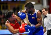 9 March 2024; Jesus Cova of Venezuela, left, in action against Jose Manuel Viafara of Columbia during their Men's 63.5kg Round of 16 bout during day seven at the Paris 2024 Olympic Boxing Qualification Tournament at E-Work Arena in Busto Arsizio, Italy. Photo by Ben McShane/Sportsfile