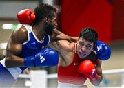 9 March 2024; Jesus Cova of Venezuela, right, in action against Jose Manuel Viafara of Columbia during their Men's 63.5kg Round of 16 bout during day seven at the Paris 2024 Olympic Boxing Qualification Tournament at E-Work Arena in Busto Arsizio, Italy. Photo by Ben McShane/Sportsfile