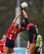 9 March 2024; Eve Power of UCC in action against Katie O'Driscoll of MTU Cork during the 2024 Ladies HEC Lynch Cup final match between Munster Technological University Cork and University College Cork at MTU Cork. Photo by Brendan Moran/Sportsfile