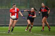 9 March 2024; Cliona Murphy of MTU Cork in action against Emily Lacey of UCC during the 2024 Ladies HEC Lynch Cup final match between Munster Technological University Cork and University College Cork at MTU Cork. Photo by Brendan Moran/Sportsfile