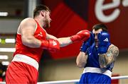 9 March 2024; Martin McDonagh of Ireland, left, in action against Danis Latypov of Bahrain during their Men's 92+kg Round of 16 bout during day seven at the Paris 2024 Olympic Boxing Qualification Tournament at E-Work Arena in Busto Arsizio, Italy. Photo by Ben McShane/Sportsfile