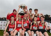 9 March 2024; The St Aidan's CBS, Dublin, team celebrate with the cup after winning the senior boys 6000m team event during the 123.ie All Ireland Schools Cross Country Championships at Tymon Park in Tallaght, Dublin. Photo by Sam Barnes/Sportsfile