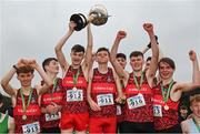 9 March 2024; The St Aidan's CBS, Dublin, team celebrate with the cup after winning the senior boys 6000m team event during the 123.ie All Ireland Schools Cross Country Championships at Tymon Park in Tallaght, Dublin. Photo by Sam Barnes/Sportsfile