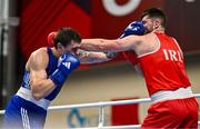 9 March 2024; Martin McDonagh of Ireland, right, in action against Danis Latypov of Bahrain during their Men's 92+kg Round of 16 bout during day seven at the Paris 2024 Olympic Boxing Qualification Tournament at E-Work Arena in Busto Arsizio, Italy. Photo by Ben McShane/Sportsfile