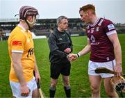 9 March 2024; Referee Shane Hynes with team captains Niall Mitchell of Westmeath and Eoghan Campbell of Antrim before the Allianz Hurling League Division 1 Group B match between Westmeath and Antrim at TEG Cusack Park in Mullingar, Westmeath. Photo by Piaras Ó Mídheach/Sportsfile