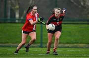 9 March 2024; Kate O'Shea of UCC in action against Rachael Evans of MTU Cork during the 2024 Ladies HEC Lynch Cup final match between Munster Technological University Cork and University College Cork at MTU Cork. Photo by Brendan Moran/Sportsfile