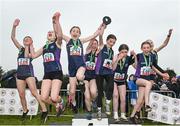 9 March 2024; The Lourdes Enniskillen team, Fermanagh, celebrate with the cup after winning minor girls 2000m team event during the 123.ie All Ireland Schools Cross Country Championships at Tymon Park in Tallaght, Dublin. Photo by Sam Barnes/Sportsfile