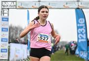 9 March 2024; Emily Bolton of Mount Sackville Sec. School Chapelizod, Dublun, crosses the finish line to win the inter girls 3500m during the 123.ie All Ireland Schools Cross Country Championships at Tymon Park in Tallaght, Dublin. Photo by Sam Barnes/Sportsfile