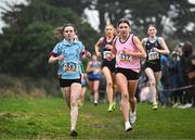 9 March 2024; Emily Bolton of Mount Sackville Sec. School Chapelizod, Dublin, right on her way to winning the inter girls 3500m, ahead of Emily Morris of Strathearn School, Belfast, who finished third, during the 123.ie All Ireland Schools Cross Country Championships at Tymon Park in Tallaght, Dublin. Photo by Sam Barnes/Sportsfile