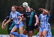 9 March 2024; Scarlett Herron of Shamrock Rovers in action against Chloe McCarthy, left, and Amber Cosgrove of DLR Waves during the SSE Airtricity Women's Premier Division match between DLR Waves and Shamrock Rovers at UCD Bowl in Belfield, Dublin. Photo by Tyler Miller/Sportsfile