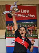 9 March 2024; UCC captain Mairead Bennett lifts the cup after the 2024 Ladies HEC Lynch Cup final match between Munster Technological University Cork and University College Cork at MTU Cork. Photo by Brendan Moran/Sportsfile