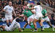 9 March 2024; Tadhg Furlong of Ireland is tackled by England players, from left, George Martin, Sam Underhill and Ellis Genge during the Guinness Six Nations Rugby Championship match between England and Ireland at Twickenham Stadium in London, England. Photo by Harry Murphy/Sportsfile