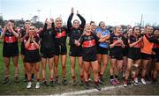 9 March 2024; UCC players celebrate after the 2024 Ladies HEC Lynch Cup final match between Munster Technological University Cork and University College Cork at MTU Cork. Photo by Brendan Moran/Sportsfile
